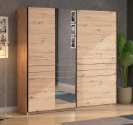 Armoire / Couleur : Chêne Artisan / Large / 1 porte miroir / Armoire à portes coulissantes / Dimensions : 220 x 61 x 217,5 cm / Chants ABS / 2 tringles à vêtements / 2 compartiments