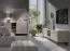 Meuble TV / 2 tiroirs / Format allongé / Couleur : Beige avec effet bois / 4 compartiments / Dimensions : 210 x 42 x 59 cm / 2 portes battantes / Pieds et poignées : métal