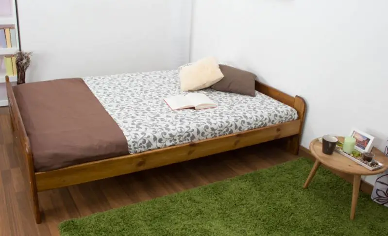 Lit futon / lit en bois de pin massif, couleur chêne A11, incl. sommier à lattes - dimension 140 x 200 cm
