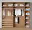 Armoire ouverte / 3 tringles à vêtements / Couleur : Chêne Puccini / 4 tiroirs intérieurs / 8 compartiments / Dimensions : 256,5 x 55 x 234 cm / 4 étagères en bois / Pour dressing-room