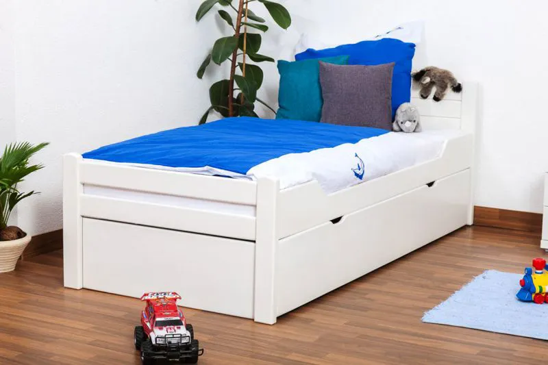 Lit pour enfant 90 x 200 cm | Bois massif: Hêtre | Laqué Blanc |incl. 2ème couchette 90 x 190 cm extensible (sommier à roulettes) et 2 Sommiers à lattes Abbildung